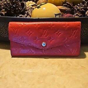 LV Empreinte portefeuille Curieuse